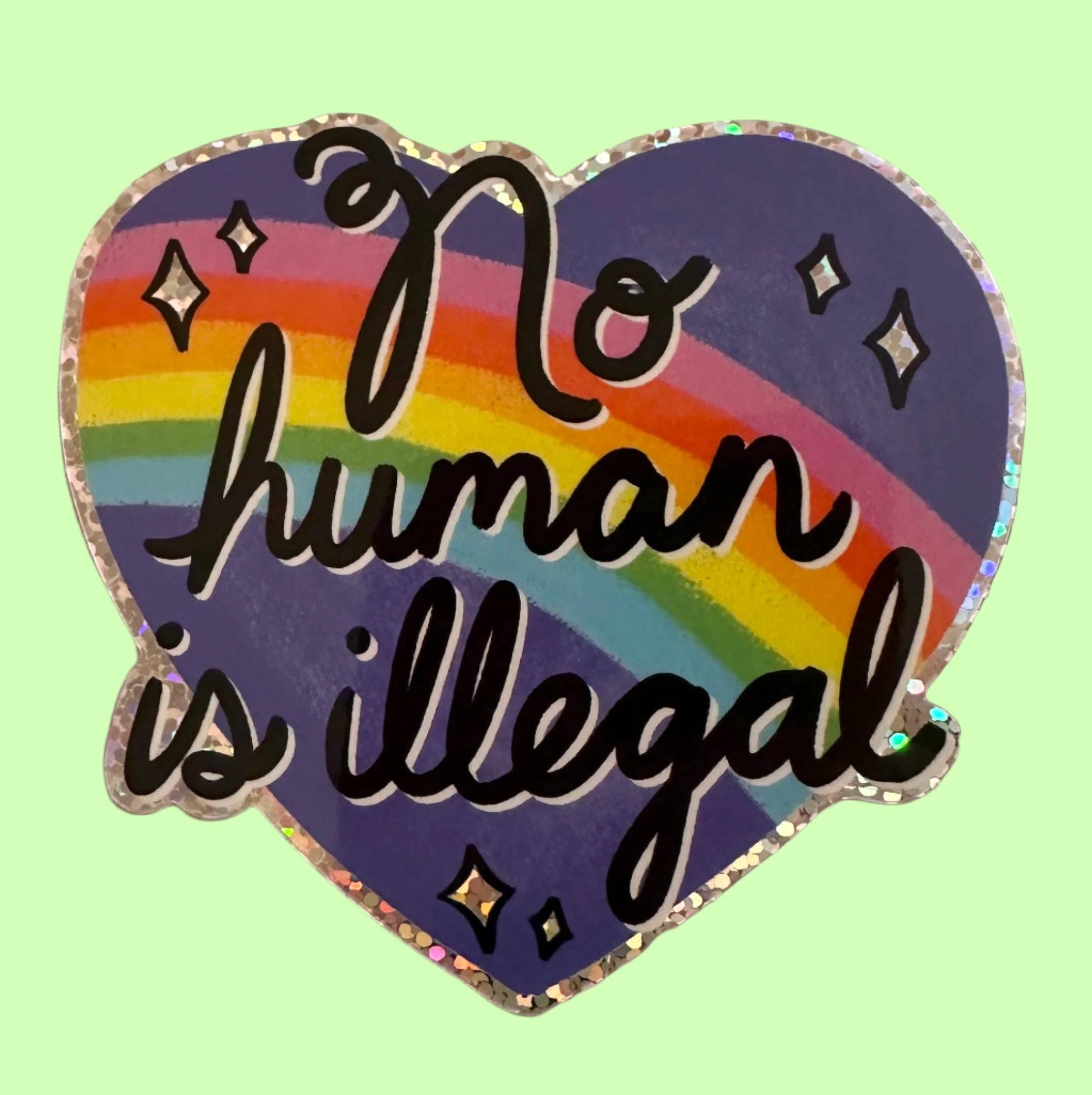 Hilarious Humanitarian - No Human Is Illegal Glitter Sticker