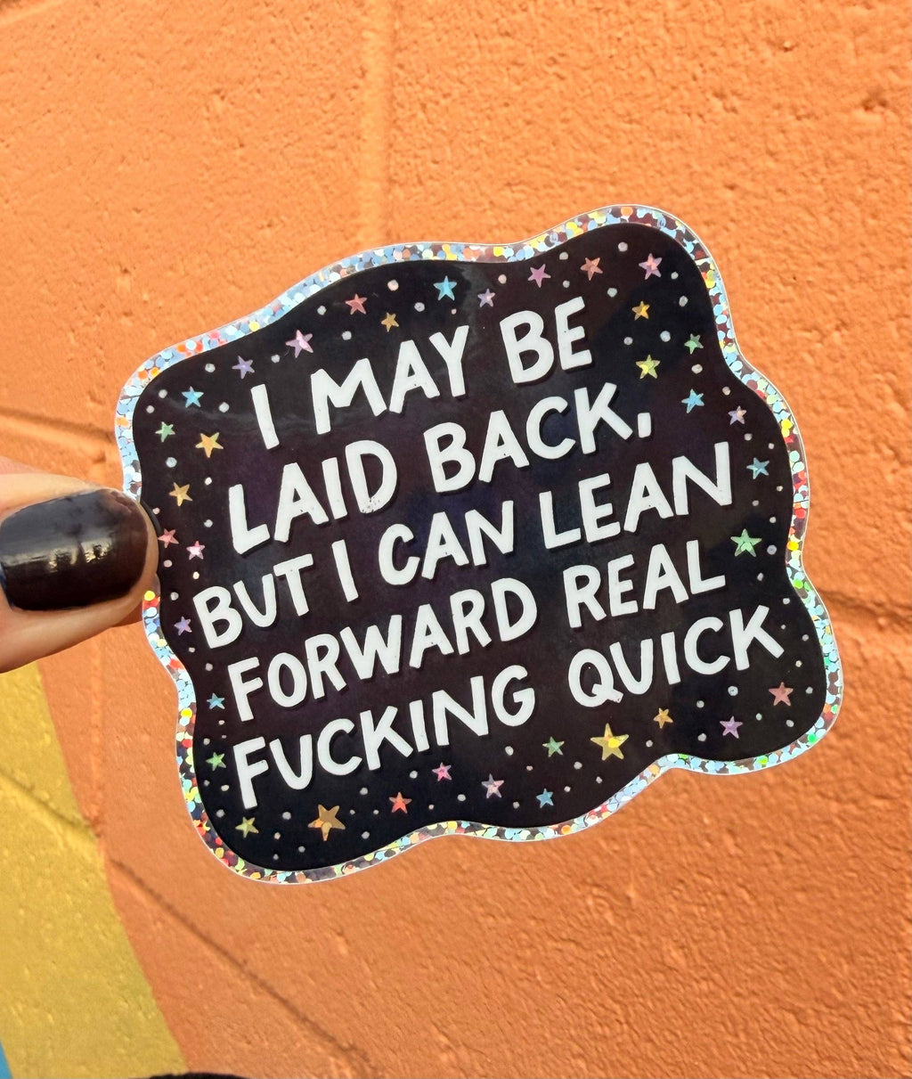 Hilarious Humanitarian - I May Be Laid Back, But I Can Lean Forward Real Fucking Quick Glitter Sticker