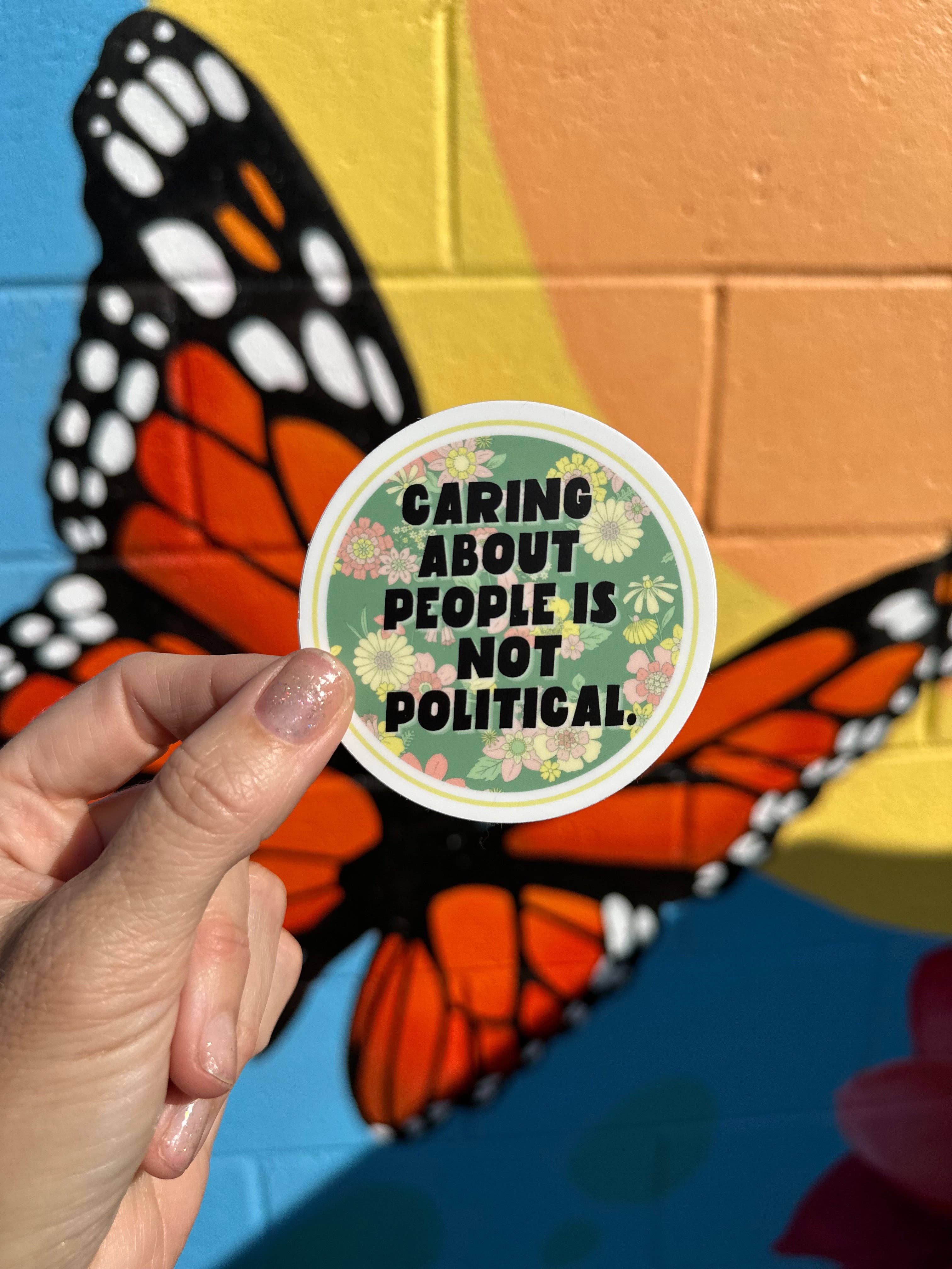 Hilarious Humanitarian - Caring About People Is Not Political Sticker