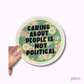 Hilarious Humanitarian - Caring About People Is Not Political Sticker
